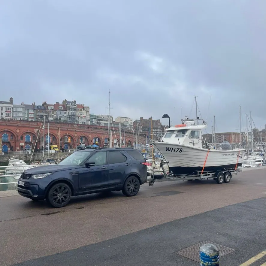Boat moved on a trailer by TD Vehicle Solutions